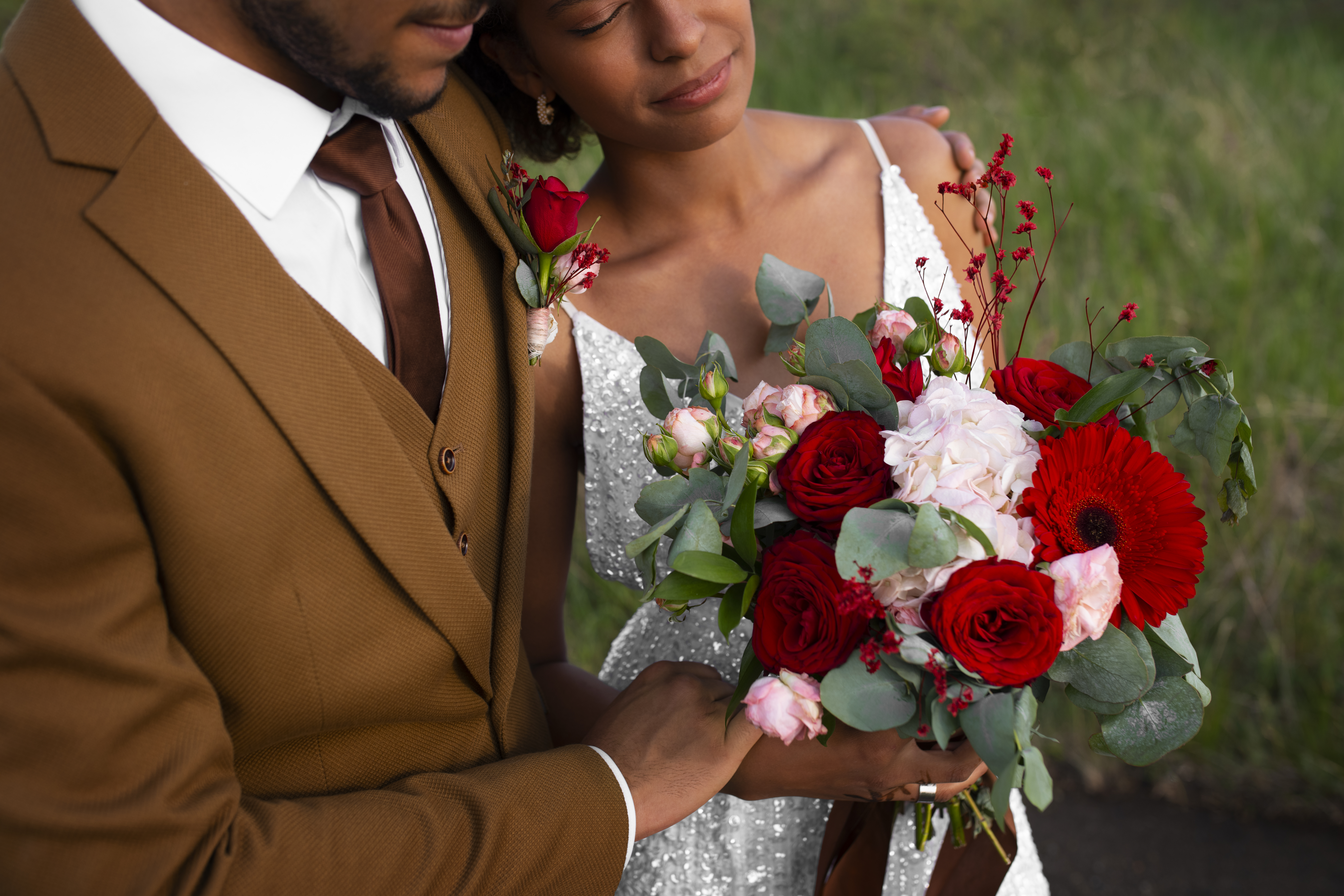 High Angle Bride Groom Posing With Flowers